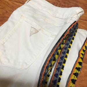 White Guess jeans and  intricate beads detail.